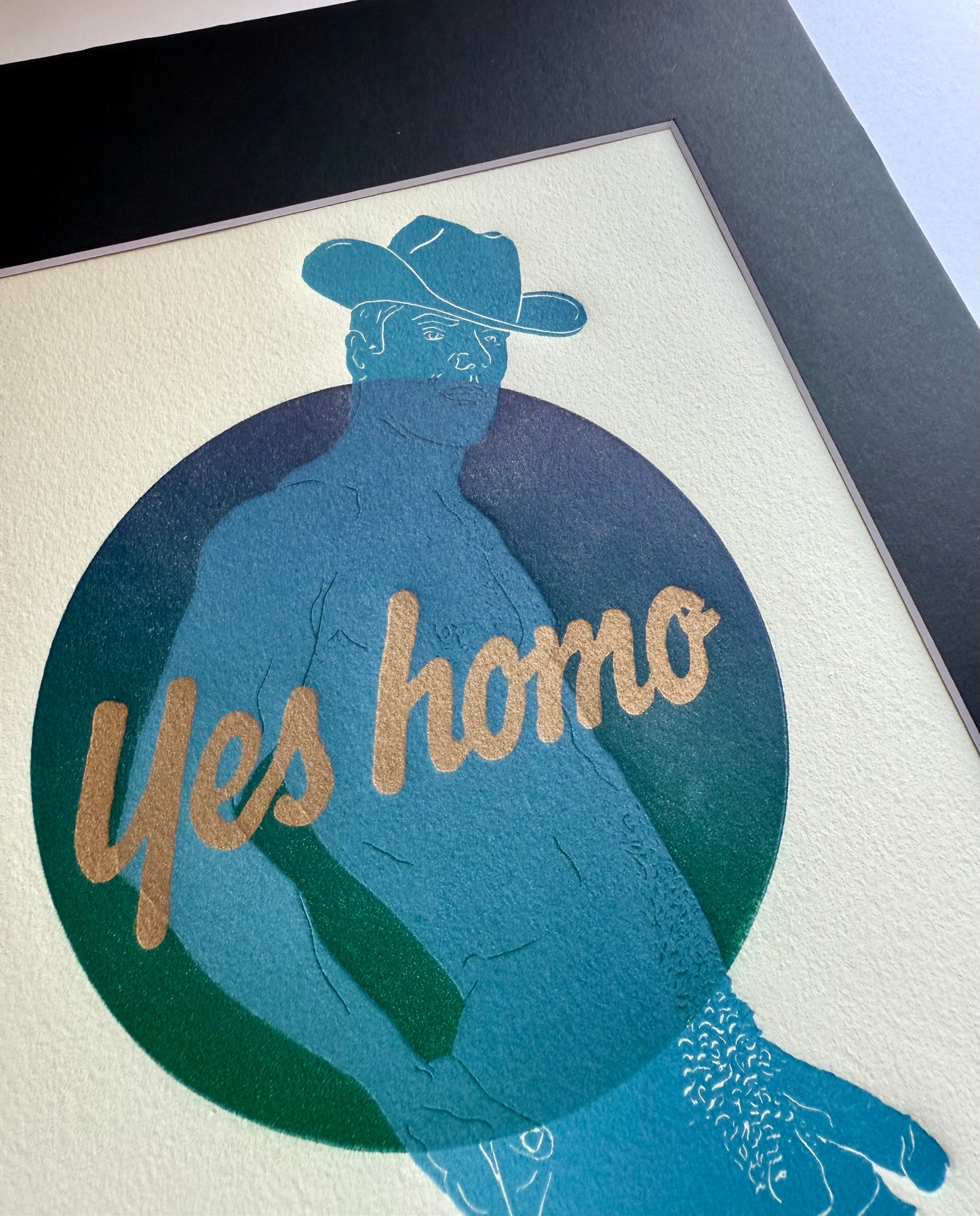 Gold “Yes Homo” on Blue Cowboy. 8x10 Art in 11x14 Mat.